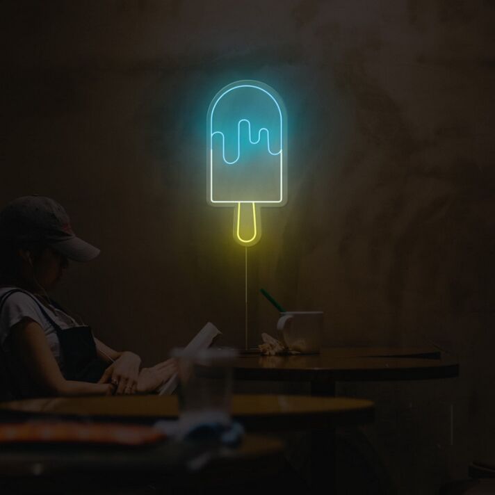 Abstraktes LED Neonschild in Eis am Stiel Form mit fließendem Linienmotiv als moderne Wanddekoration für Café Küche Bar oder kreativen Innenraum