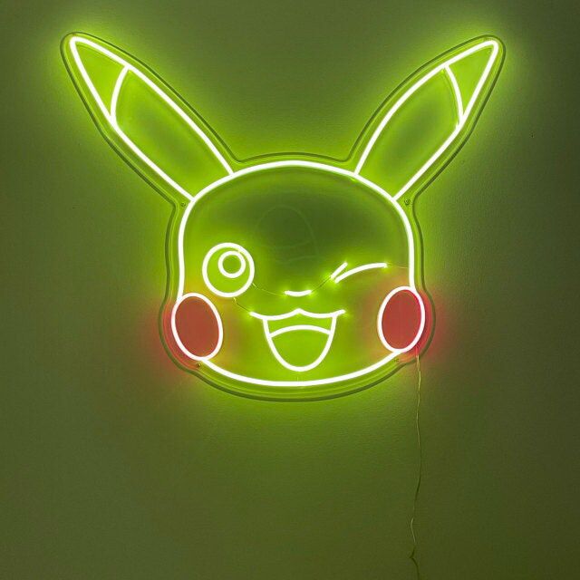 Niedliches Cartoon Gesicht LED Neonschild mit zwinkerndem Ausdruck für Kinderzimmer und moderne Wanddeko