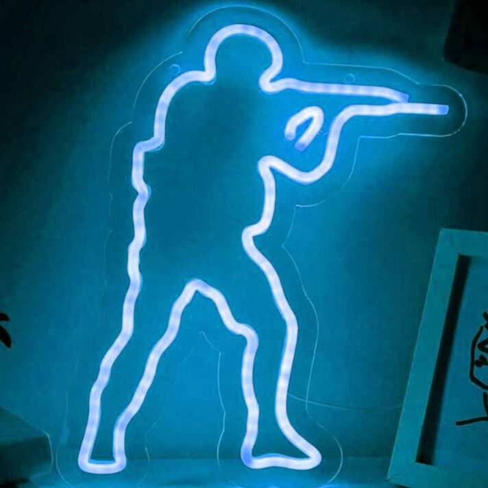 Modernes LED Neonschild mit abstrakter menschlicher Figur und dynamischer Pose als auffällige Wanddekoration für kreative Räume Studios oder moderne Interieurs