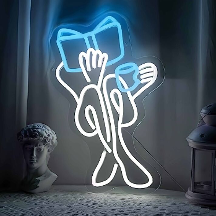 Dekoratives LED Neonschild mit lesender Figur und Buch Motiv als stilvolle Wandbeleuchtung für Arbeitszimmer Leseecke oder Wohnzimmer