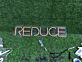 REDUCE LED-Neonschild Büro Nachhaltigkeitsevent