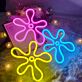 Blumenmotiv im Retro-Stil als LED-Neonschild
