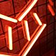 Abstraktes Symbol LED Neonlicht in Orange für moderne Wanddekoration
