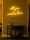 All You Need Is Love Neon Singing the Tune of Universal Love
