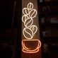 Dekoratives LED Neonschild mit Kaffeetassenmotiv und aufsteigenden Kaffeebohnen als stilvolle Wandbeleuchtung für Café Küche Bar oder moderne Gastrobereiche