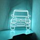 LED Neonschild mit frontaler Geländewagen Silhouette und klarer Fahrzeug Linienführung als moderne Wandbeleuchtung