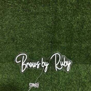 Brighten Up Your Beauty Salon, Spa, or Home Vanity Space with Brows By Ruby White Custom LED Neon Sign.