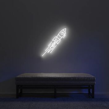 Kleines Raketen LED Neonschild in Warmweiß im schlichten Design als dezente Wanddekoration für moderne Wohnräume und Kinderzimmer