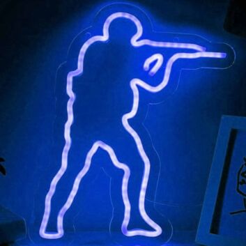 Modernes LED Neonschild mit abstrakter menschlicher Figur und dynamischer Pose als auffällige Wanddekoration für kreative Räume Studios oder moderne Interieurs