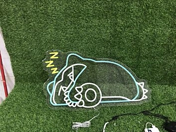 schlafendes Fantasiewesen LED Neonschild für Kinderzimmer und Gamingraum