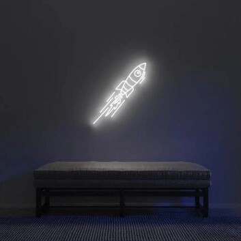 Kleines Raketen LED Neonschild in Warmweiß im schlichten Design als dezente Wanddekoration für moderne Wohnräume und Kinderzimmer