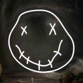 Abstraktes LED Neonschild mit minimalistischem Gesicht Motiv in warmem Weiß als moderne Wanddekoration für Wohnräume
